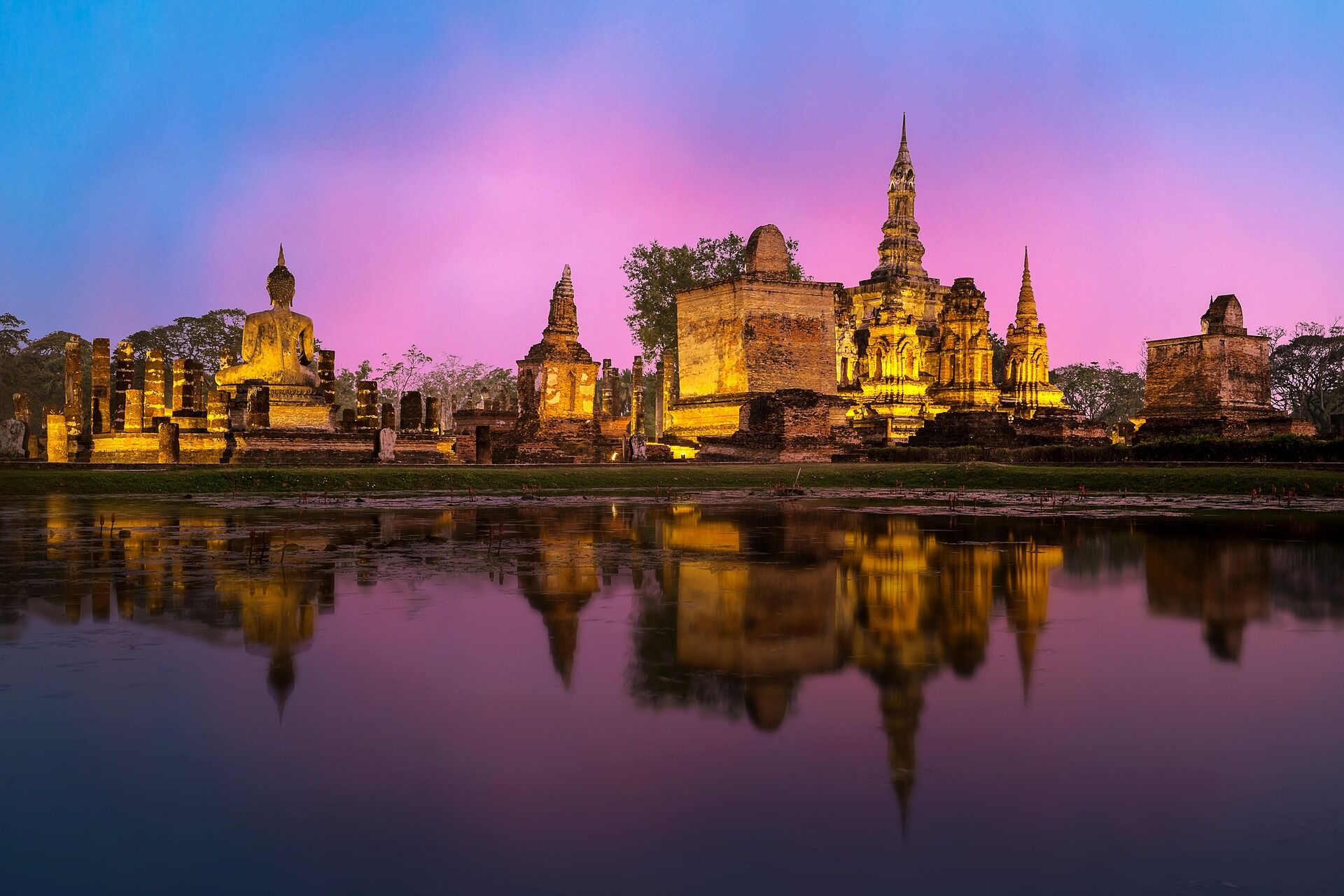 Vibrant Thailand temples in Bangkok on a scenic Thailand Travel banner by Legend Travel Group.
